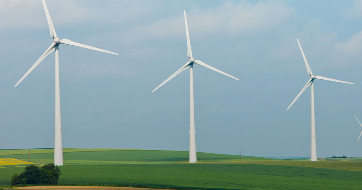 three onshore wind turbines